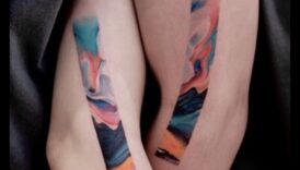 الجمال السائل: اكتشف أناقة الوشم بالألوان المائية